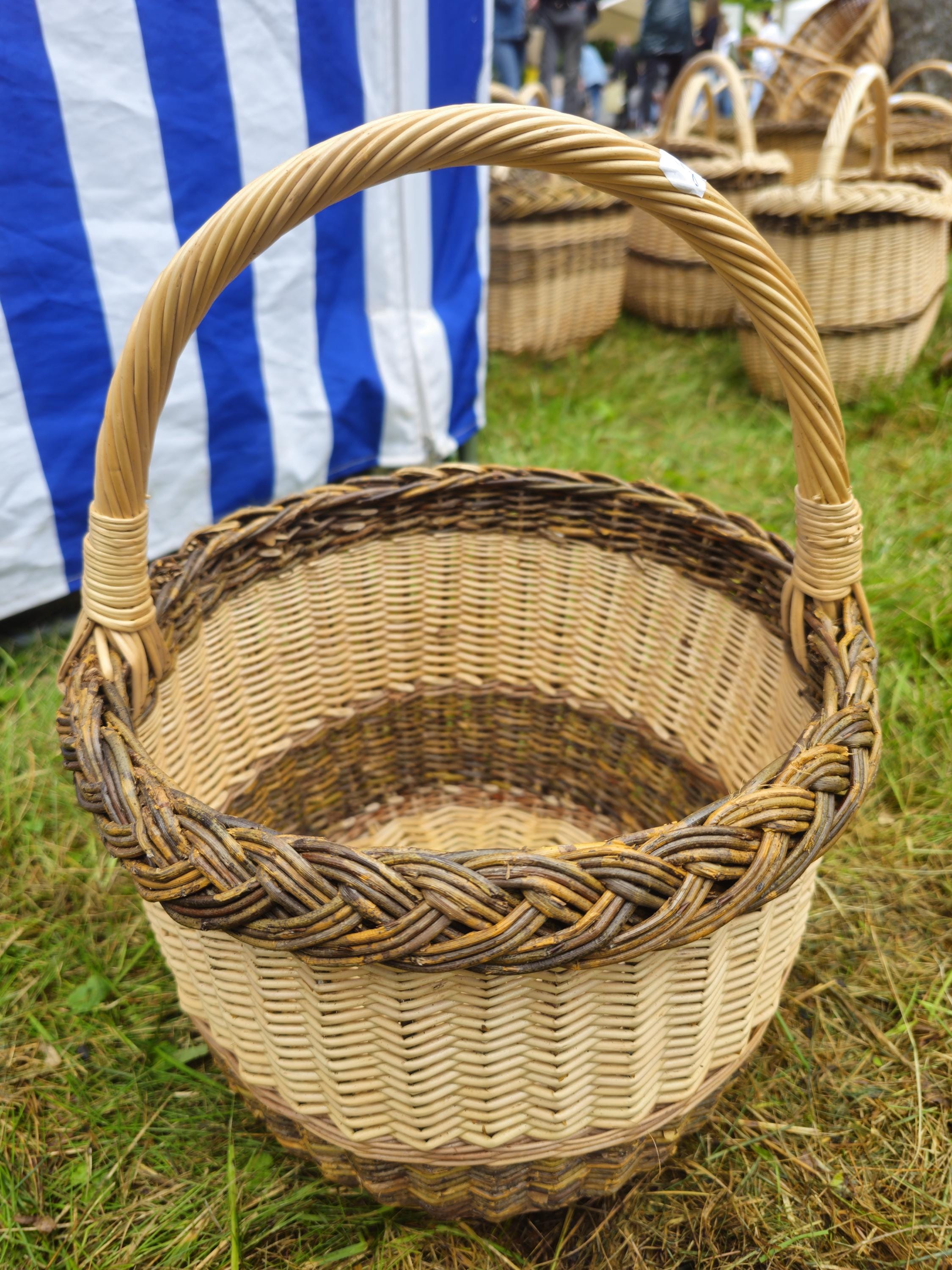 Wicker Basket with Dark Braided Rim – Rustic Handwoven Storage Basket